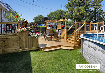 Patio with overground pool by Patio Design inc.