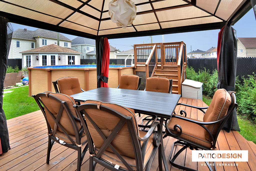 Patio around above ground pool by Patio Design inc.