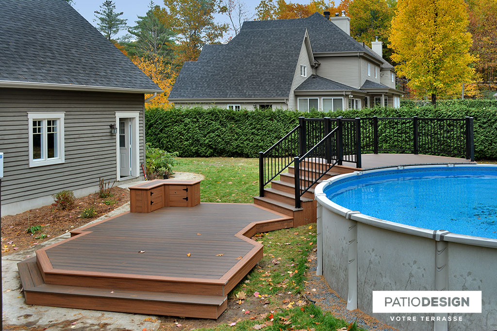 Patio around above ground pool by Patio Design inc.