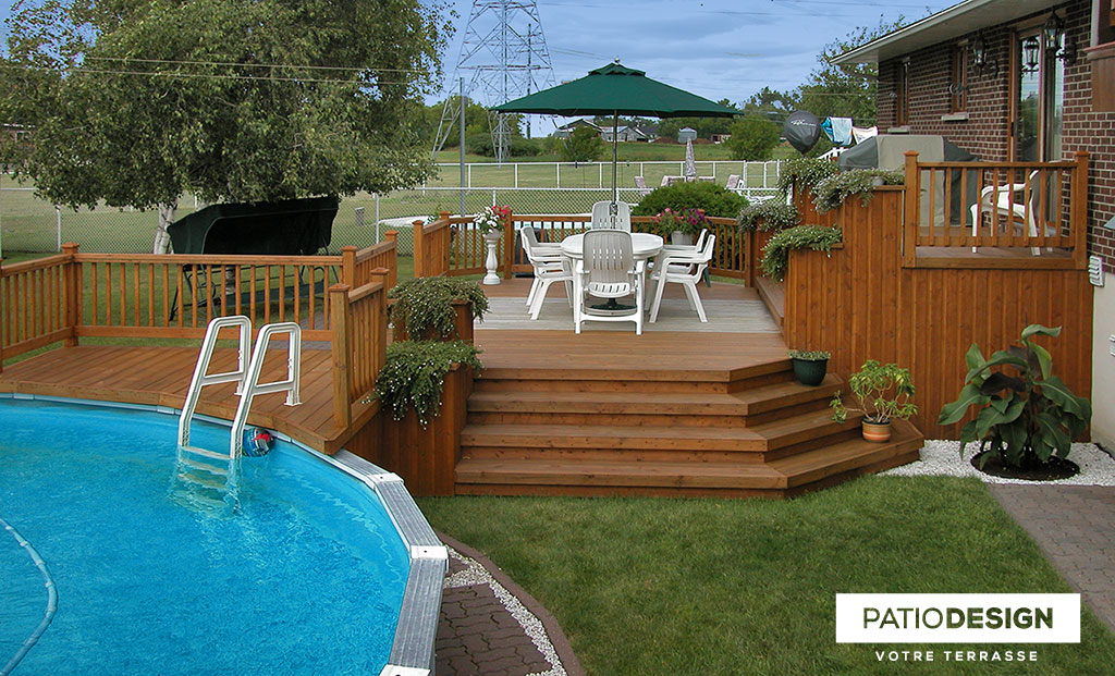 Patio around above ground pool by Patio Design inc.