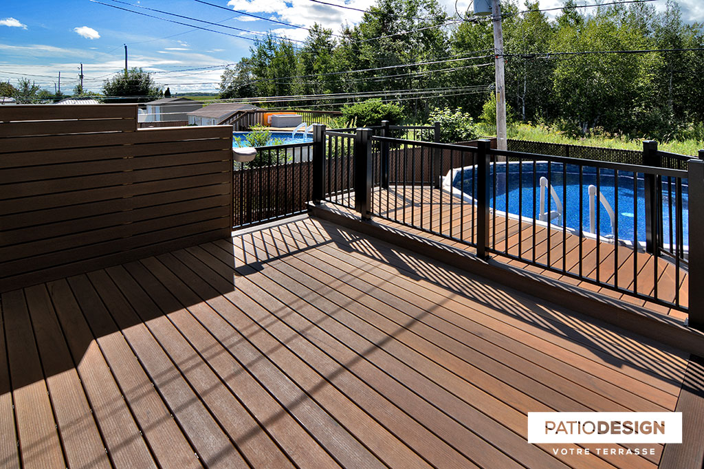 Patio around above ground pool by Patio Design inc.