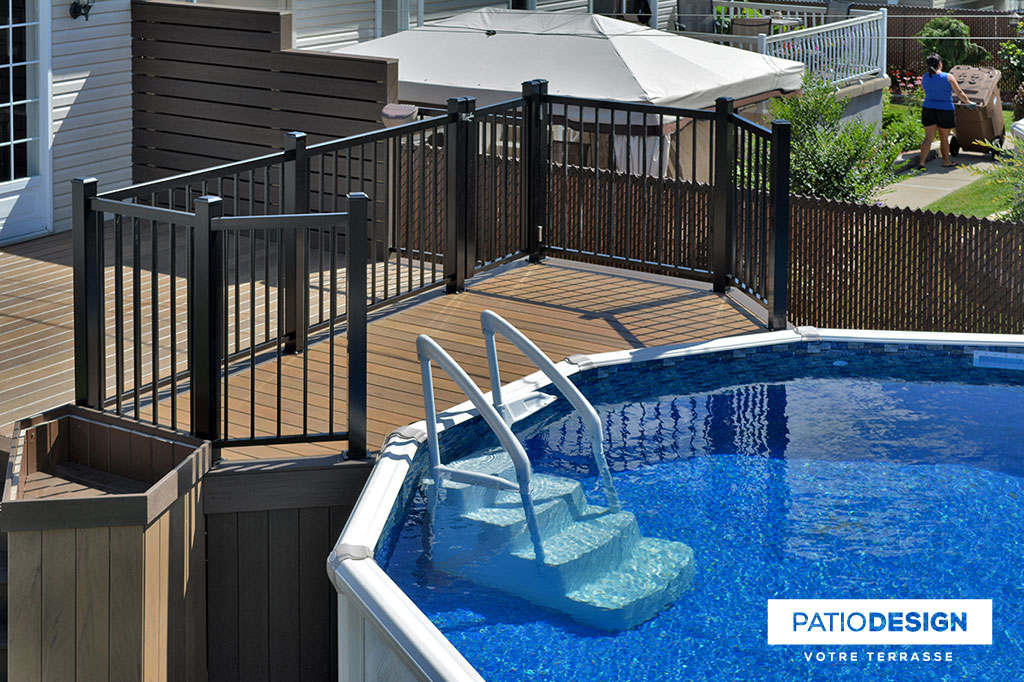 Patio around above ground pool by Patio Design inc.