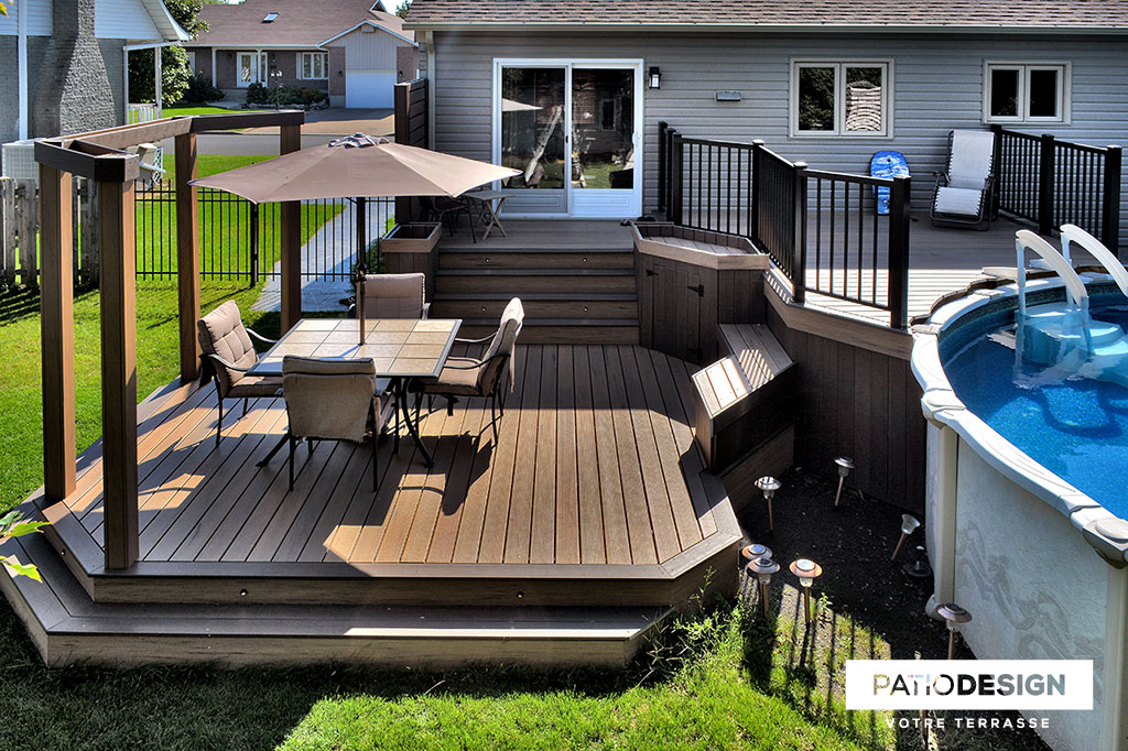 Patio around above ground pool by Patio Design inc.