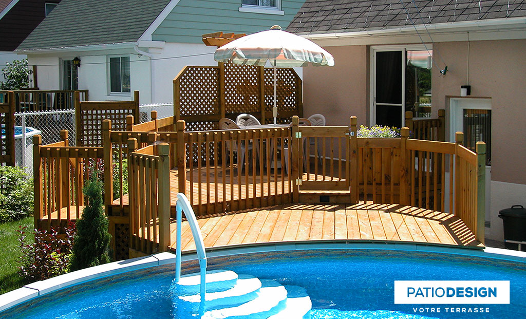 Patio around above ground pool by Patio Design inc.