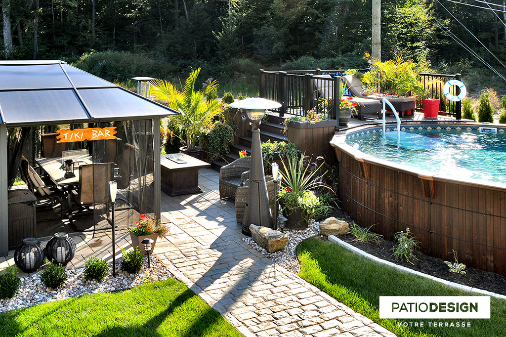 Patio around above ground pool by Patio Design inc.
