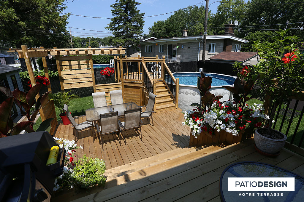 Patio around above ground pool by Patio Design inc.