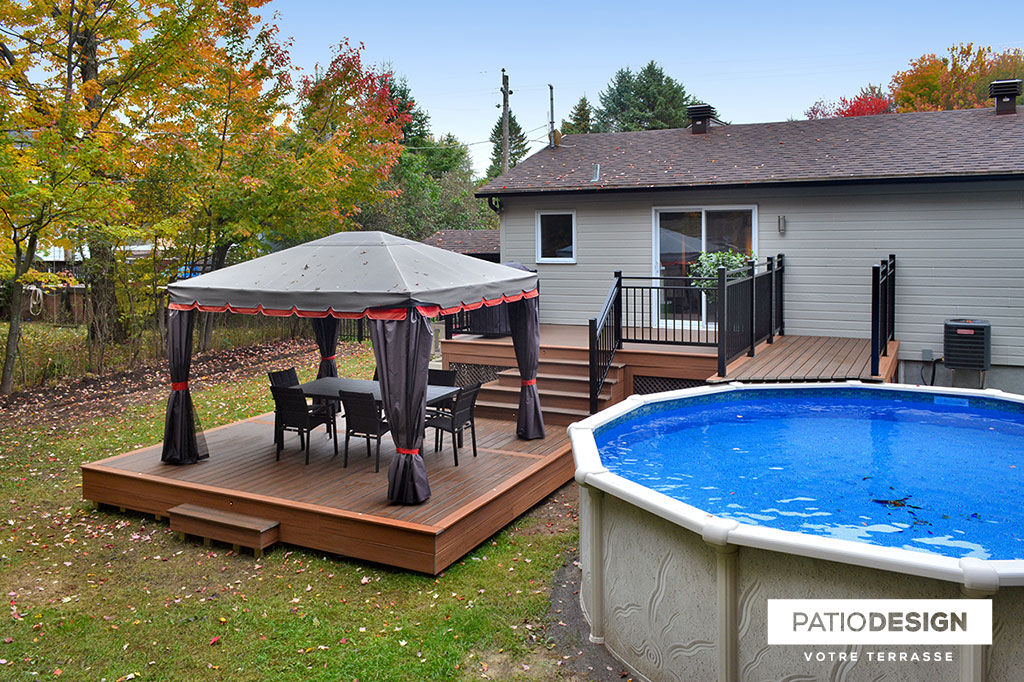 Patio around above ground pool by Patio Design inc.