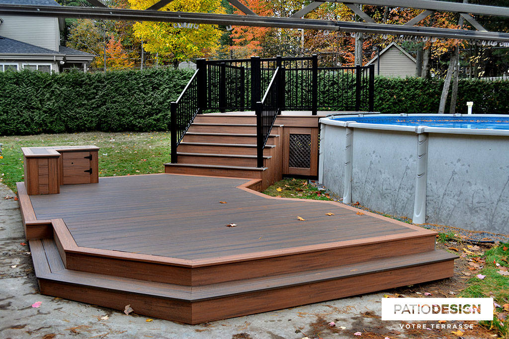 Patio around above ground pool by Patio Design inc.