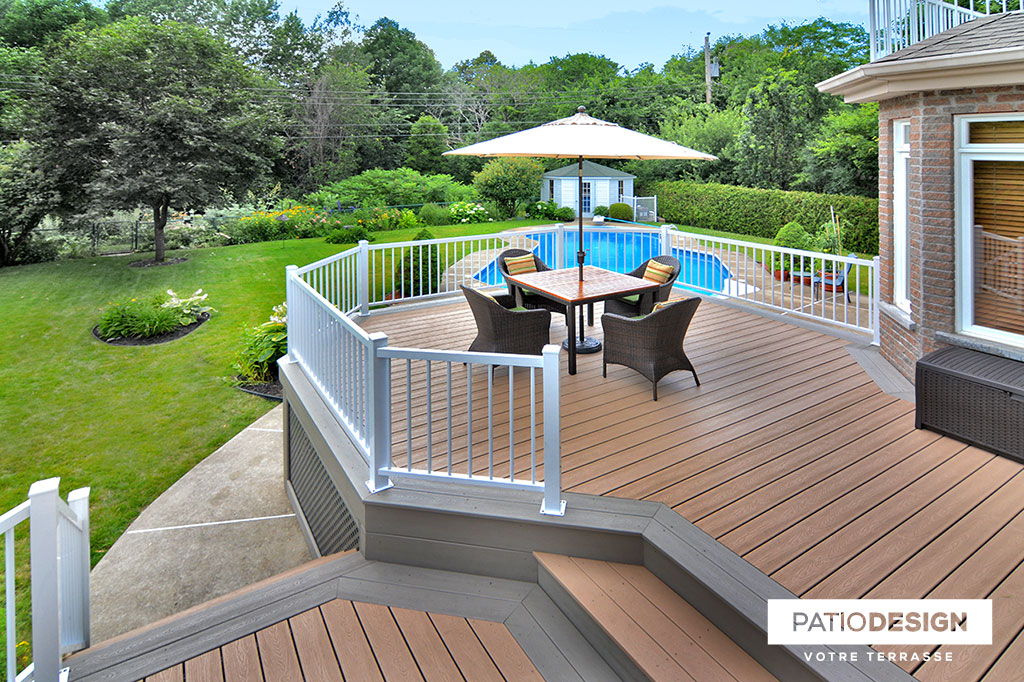 Patio around an inground pool by Patio Design inc.