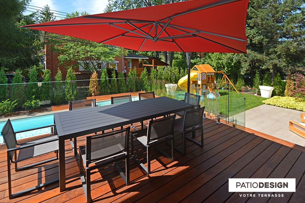 Patio around an inground pool by Patio Design inc.