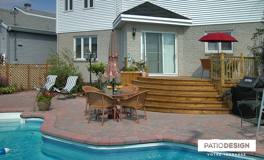 Patio around an inground pool by Patio Design inc.