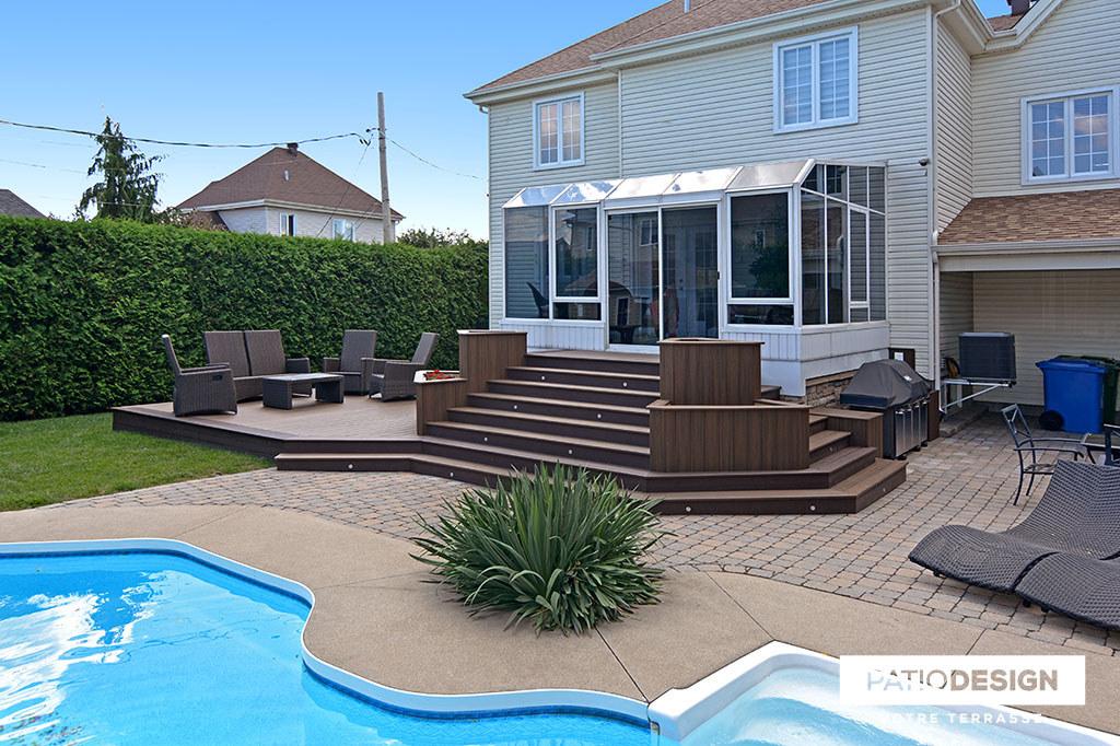 Patio around an inground pool by Patio Design inc.