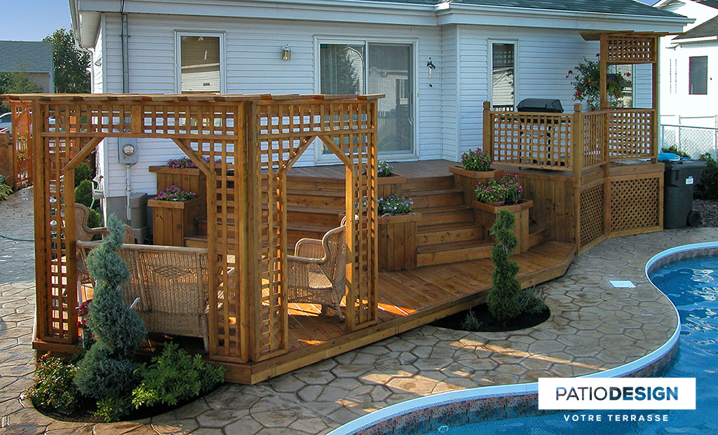 Patio around an inground pool by Patio Design inc.