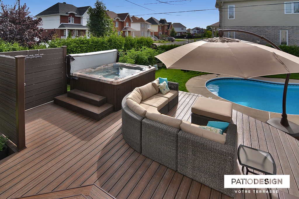 Patio around an inground pool by Patio Design inc.