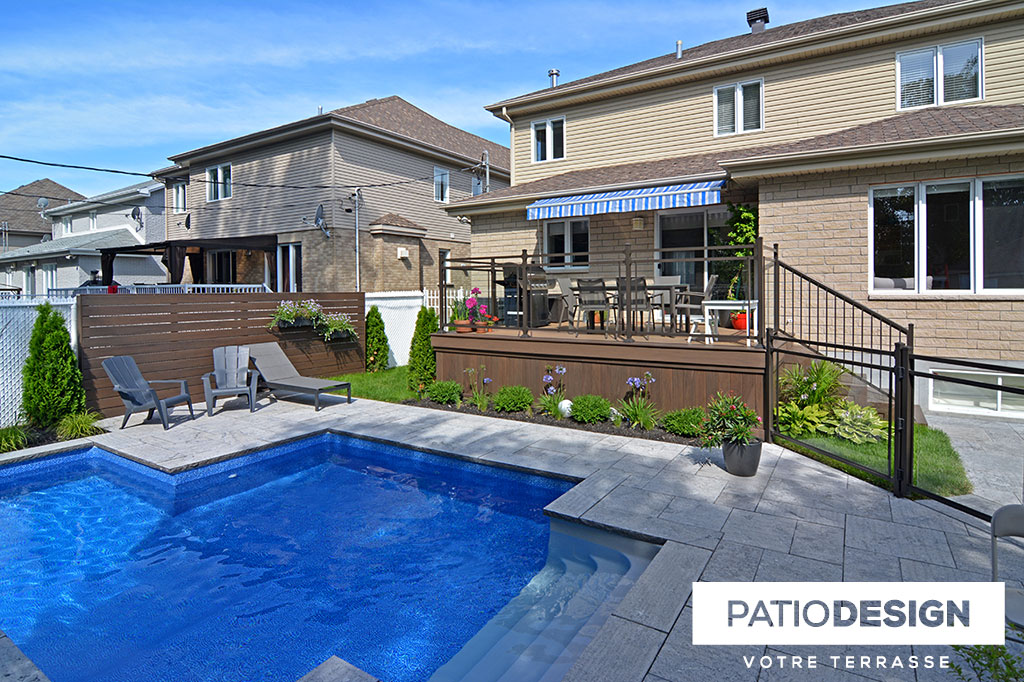 Patio around an inground pool by Patio Design inc.