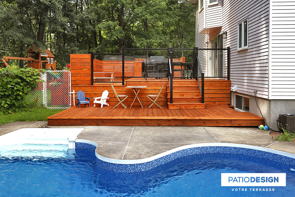 Patio around an inground pool by Patio Design inc.
