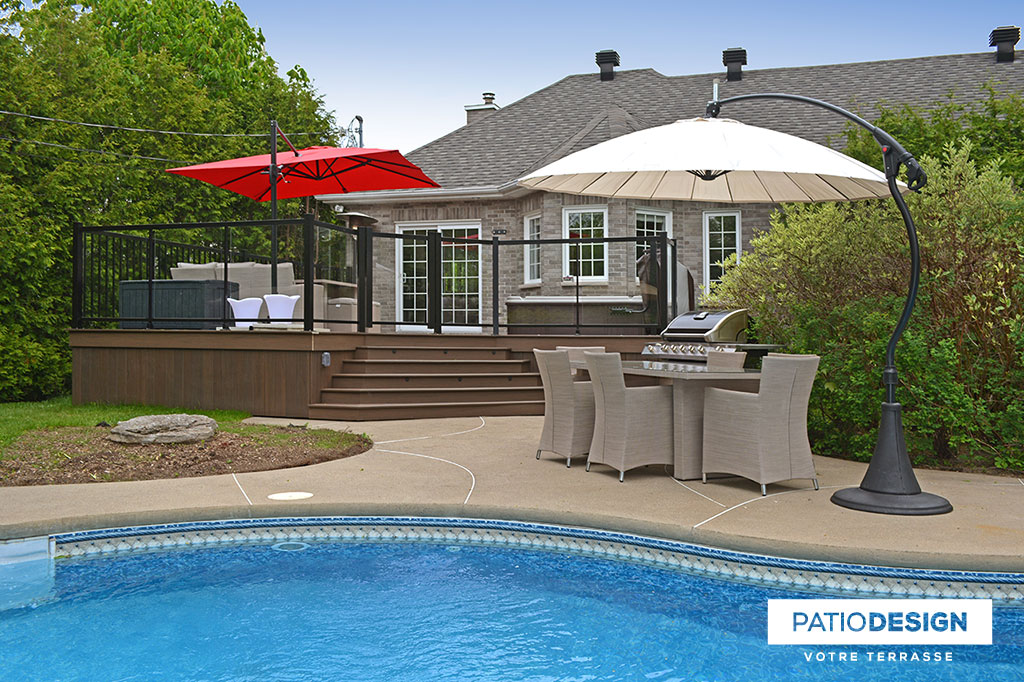 Patio around an inground pool by Patio Design inc.