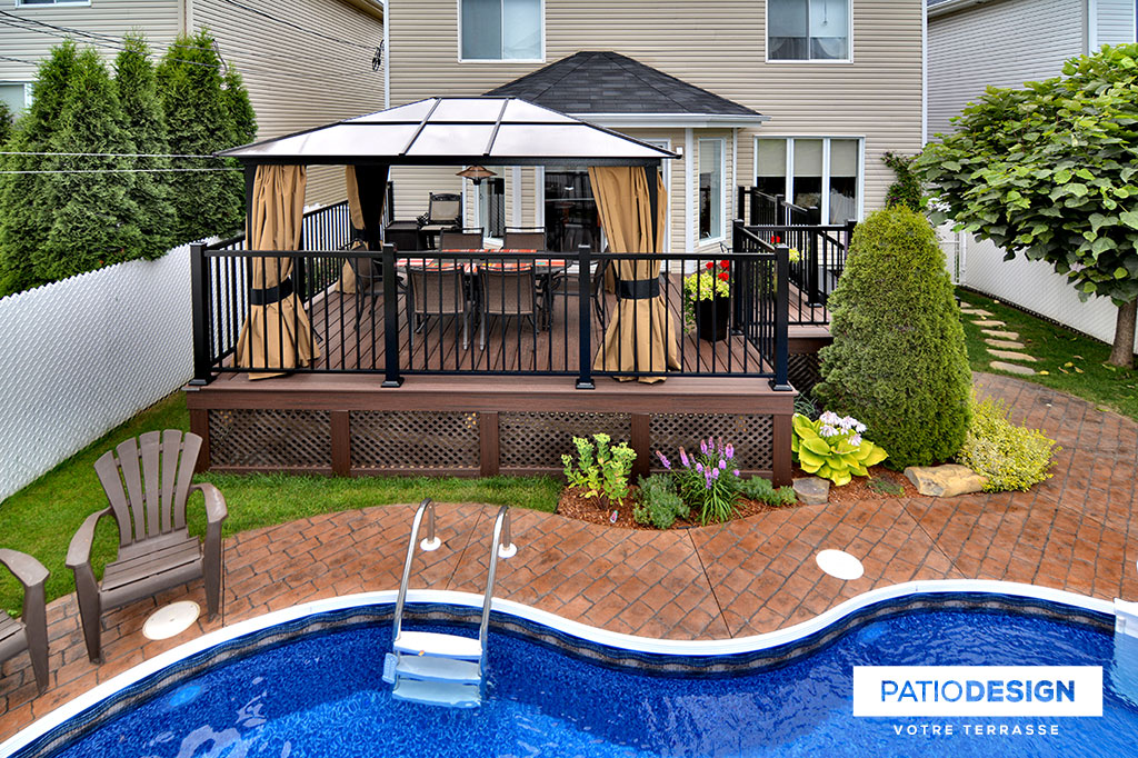 Patio around an inground pool by Patio Design inc.