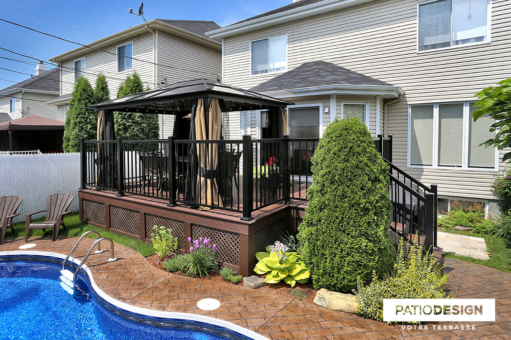Patio around an inground pool by Patio Design inc.