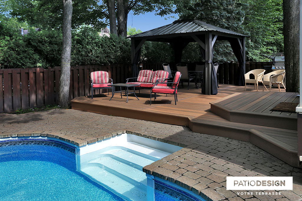 Patio around an inground pool by Patio Design inc.